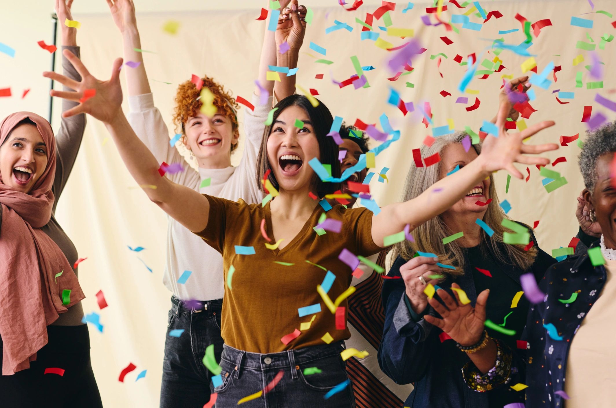 Group celebrating together with festive energy