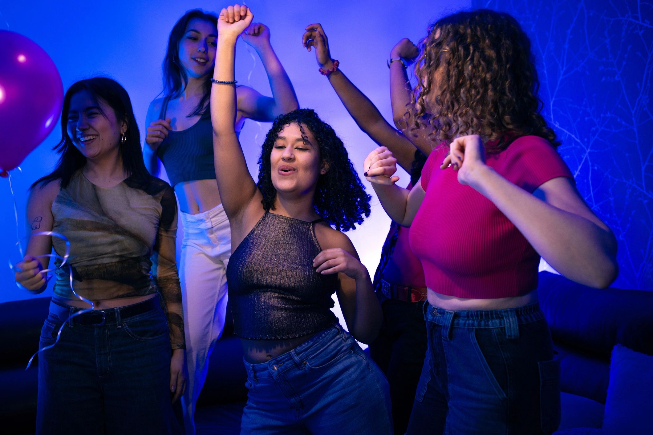 Party crowd enjoying music and dancing